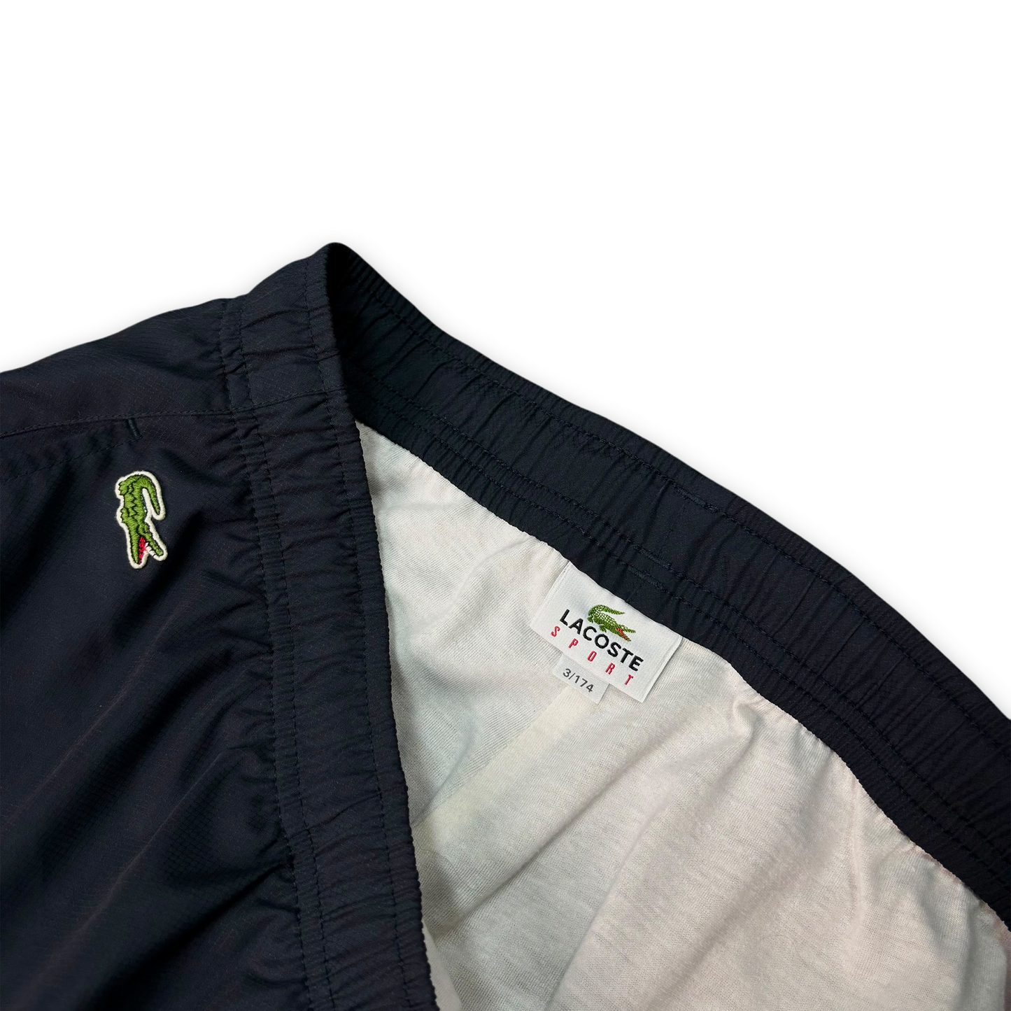 Lacoste track pants (M)